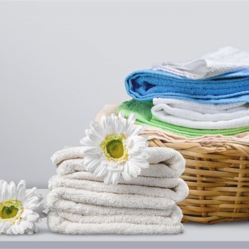 miele washing machine wdb020 eco clean laundry in the basket flowers on towels 